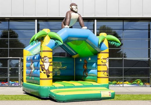Standard-dschungel-hüpfburg in auffälligen Farben mit einem großen gorilla-3D-objekt auf der oberseite für kinder zu verkaufen. Kaufen sie eine indoor-hüpfburgen online bei JB-Hüpfburgen Deutschland