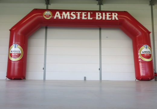 Aufblasbarer bogen, maßgefertigter Amstel-bier-werbebogen zum kauf bei JB-Hüpfburgen Deutschland. Bestellen sie maßgeschneiderte aufblasbarer reklamebogen online bei JB-Hüpfburgen Deutschland