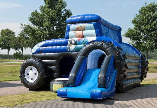 Overdekt maxi multifun blauw springkussen met glijbaan in thema tractor kopen voor kinderen. Bestel springkussens online bij JB Inflatables Nederland